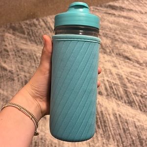 Glass Water Bottle, Turquoise. Never been used. comes with removable cover.